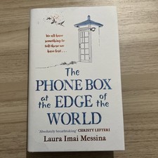 THE PHONE BOX AT THE EDGE OF